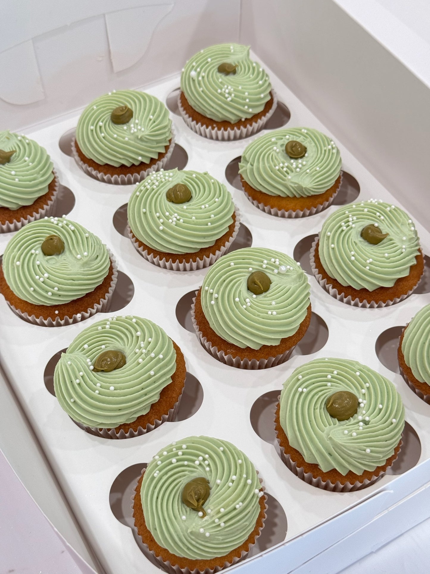 VANILLA PISTACHIO WHIPPED CREAM CUPCAKES